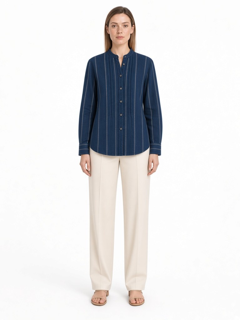 FM-LK-049 Navy shirt with fine vertical stripes, band collar, button front, front pintuck detailing, long sleeves and curved hem shown on a model